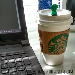 starbucks cup with laptop