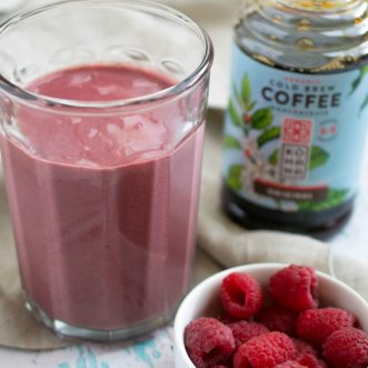 Need a quick, simple, healthy smoothie recipe with a caffeine kick? This Raspberry Mocha Protein Smoothie is perfect for you!