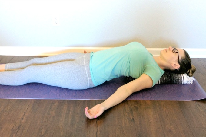 Supported Corpse Pose - Runners tend to repeat their favorite yoga poses. Is your routine missing these important poses that runners should be doing to prevent injury?
